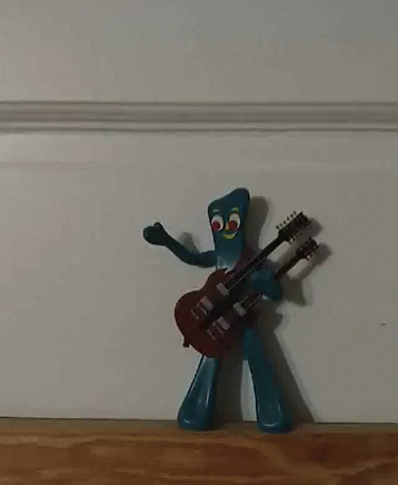 Blue Cartoon Character Playing Double Neck Guitar