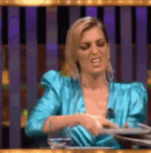 Blue Dress Woman Making Funny Face at Tray