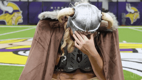 Blue-Eyed Bearded Man Looking At Camera GIF