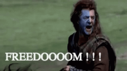 Blue-Faced Man Holding Sword Says Freedom