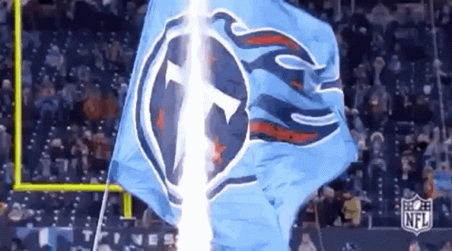 Blue Flag With T Flying In Wind GIF