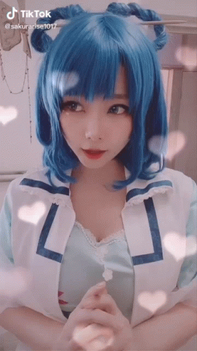 Blue-Haired Girl in Sailor Jacket