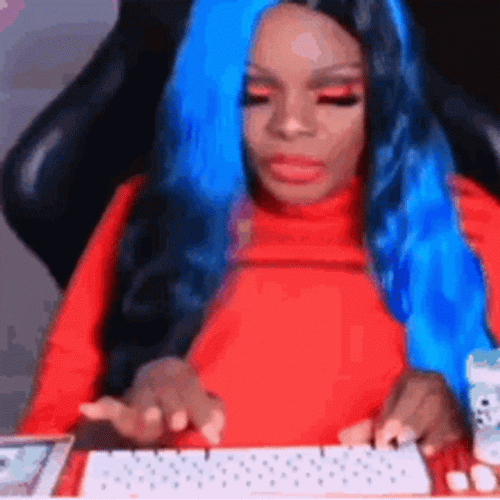 Blue Haired Lady Chewing Typing Fast GIF