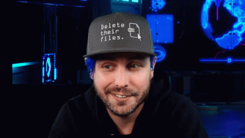 Blue Haired Man With Delete Their Files Hat GIF