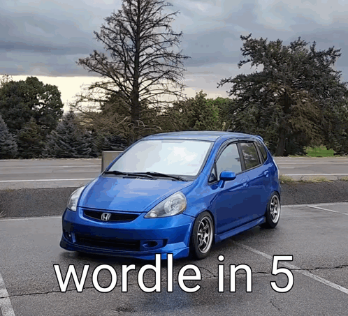 Blue Honda Car Parked with Wordle in 5