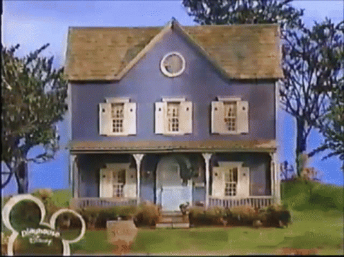 Blue House With White Shutters