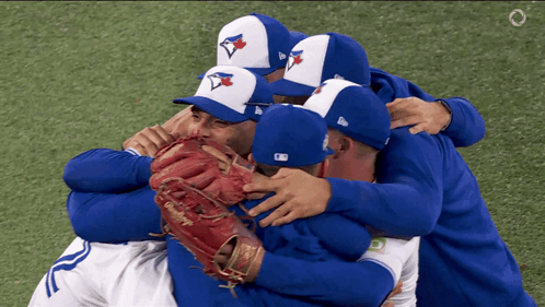 Blue Jays Baseball Players Hugging GIF