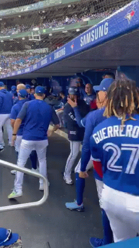 Blue Jays Baseball Players in Dugout