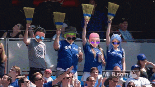 Blue Jays Fans Holding Brooms