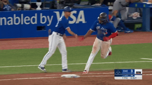 Blue Jays Player Running To Another Player GIF