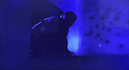 Blue Light Shining on Person's Head