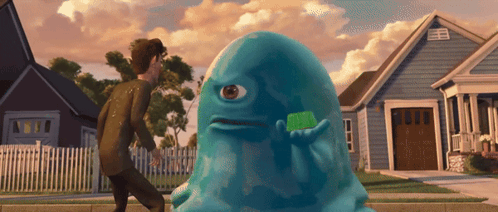 Blue Monster Holding Green Object