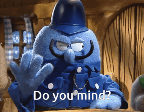 Blue Puppet with Mustache and Helmet Says Do You Mind