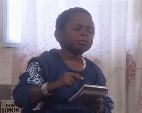 Blue-Shirt Boy Holding Calculator At Don Simon GIF