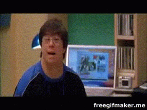 Blue Shirt Man at Computer freegifmaker.me