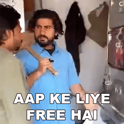 Blue Shirt Man Holding Stick, Another Says Aap Ke Liye Free Hai GIF