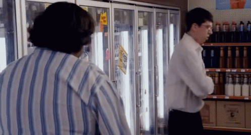 Blue Shirt Man I'm Jealous Brick Wall GIF