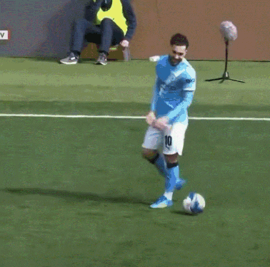 Blue Shirt White Shorts Man Kicking Soccer Ball GIF