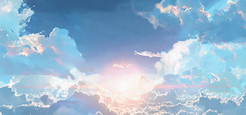 Blue Sky with Sun Shining Through Clouds
