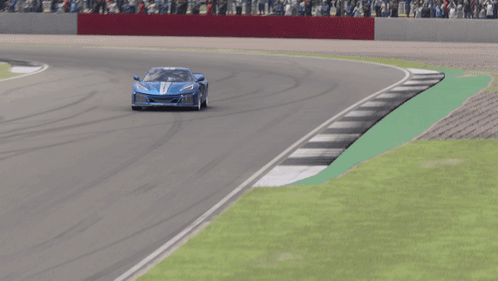 Blue Sports Car Driving on Track