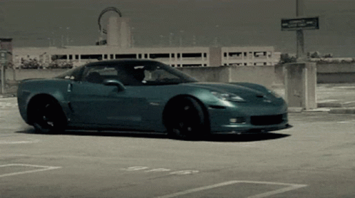 Blue Sports Car With Valet Sign GIF