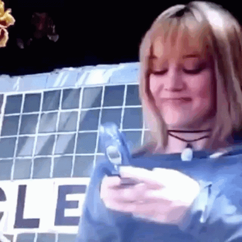 Blue Sweatshirt Woman With Phone By Le Sign GIF
