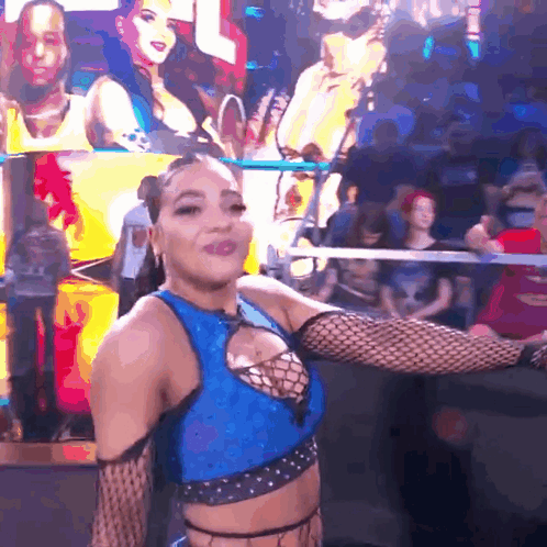 Blue Top Woman Dancing in Black Fishnet Gloves