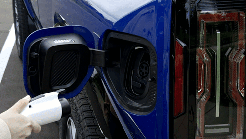 Blue Truck Being Charged With Charger GIF