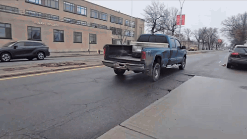 Blue Truck Driving in Front of Oberlin College