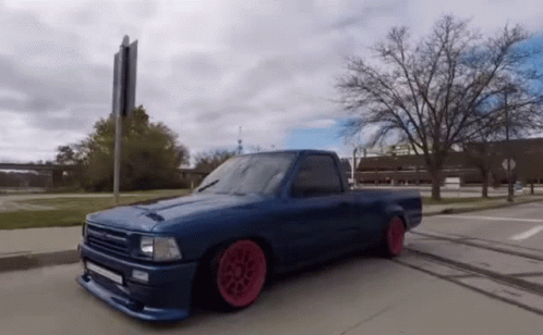 Blue Truck with Red Wheels