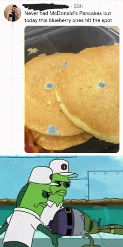 Blueberry Pancake Next to Man Holding McDonald's Pancake