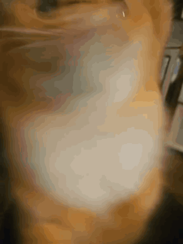 Blurred Cat with White Spots
