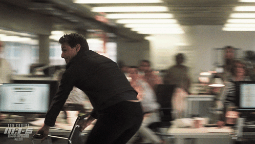 Blurred Man In Office MR E GIF