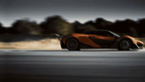Blurred Orange Sports Car Driving