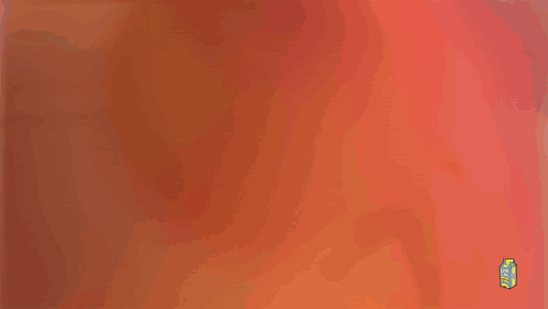 Blurred Person in Green Suit Holding Orange Balloon