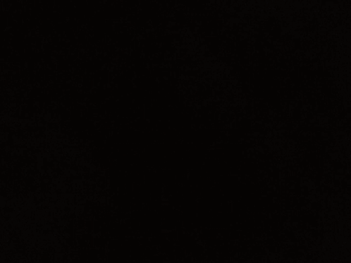 Blurred Person Swimming in Dark