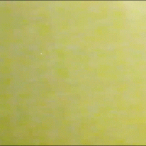 Blurred Person Walking Down Hallway