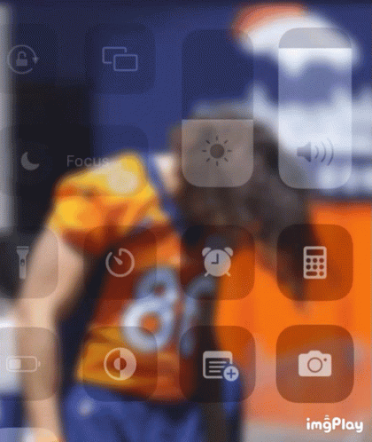 Blurred Phone Screen With Calculator and Flashlight