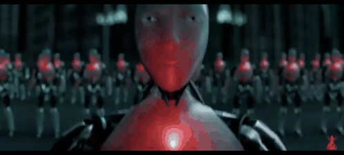 Blurred Robot With Red Light From Chest