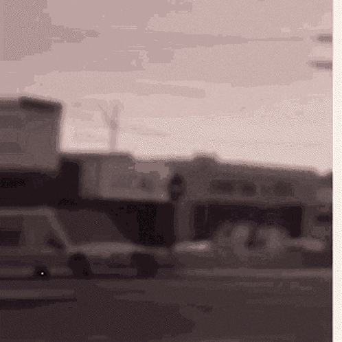 Blurred Street With Sign Saying A