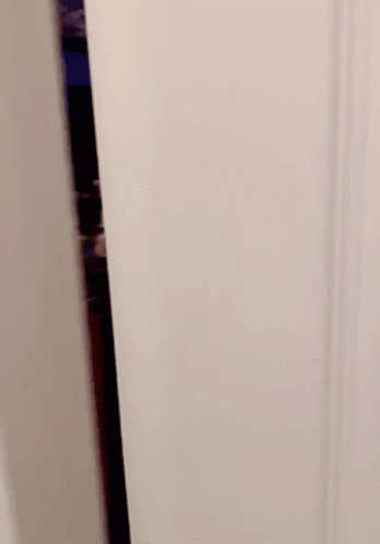 Blurred White Wall With Objects GIF