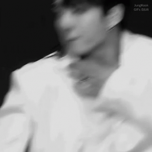 Blurry Black and White Man's Face and Neck