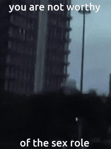 Blurry Building Saying You Are Not Worthy of the Sex Role