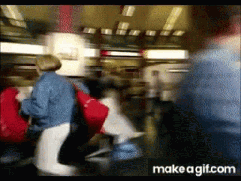Blurry Crowd Walking in Airport