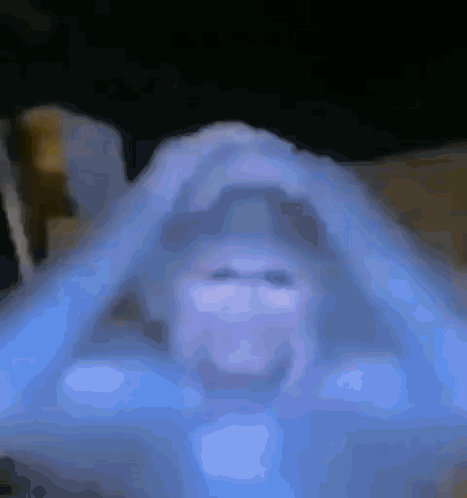 Blurry Face With Blue Glow GIF
