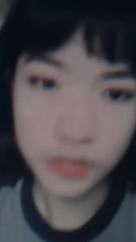 Blurry Girl in Blue Shirt