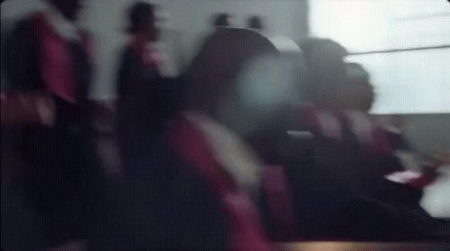 Blurry Group of People Sitting on a Plane