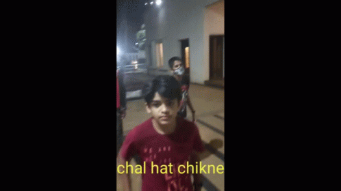 Blurry Image of Person Walking Chal Hat Chikne in Yellow