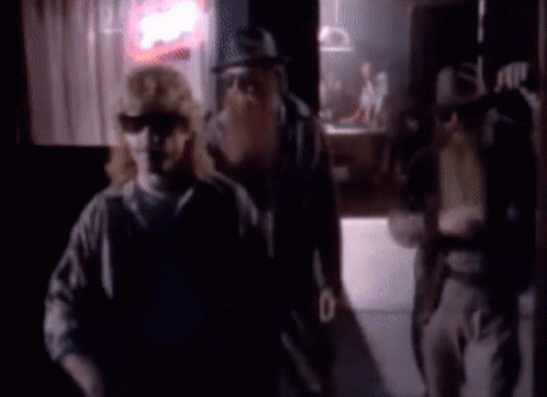 Blurry Man And Woman In Dark Room GIF