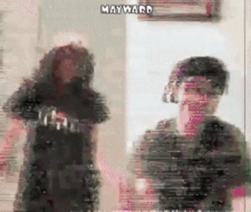 Blurry Man and Woman Mayward